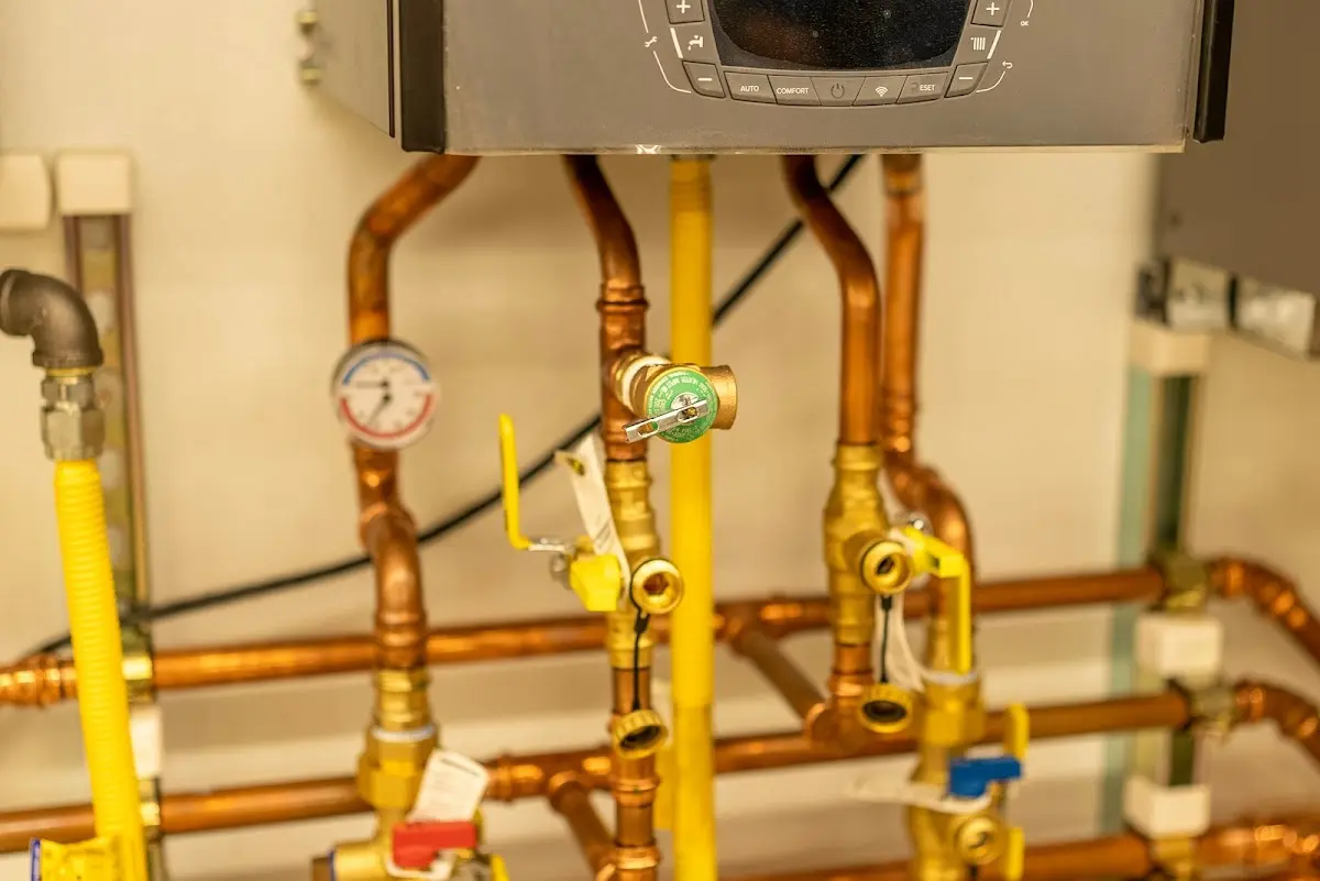 Licensed technician providing Backflow Prevention for a homeowner in Clarkson